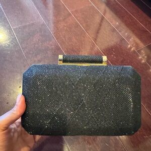 New INC mesh black and gold clutch